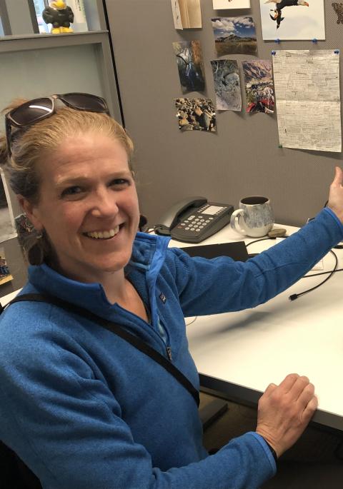 Brenda at her desk, showing math work on her computer screen