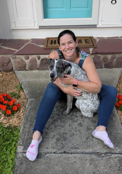 Jenny on the stoop with her dog Zoey