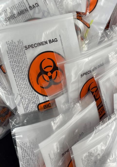 bags of biological samples on desk