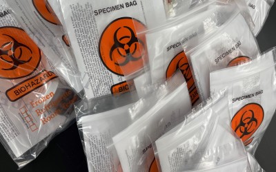 samples in bags with biological hazard symbol
