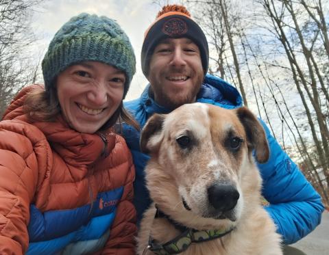 Dr. Kaganer and her partner with their dog Meeko on a family walk