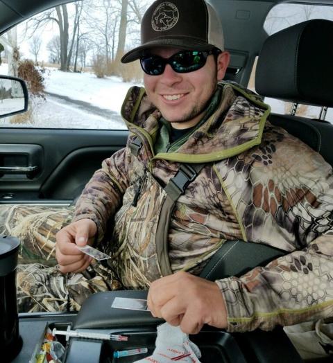 Aidan preparing slides while in the field