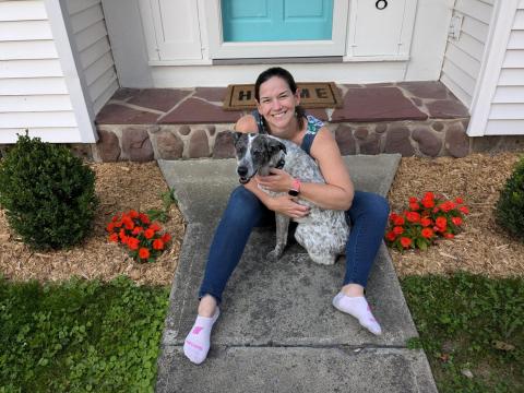 Jenny on the stoop with her dog Zoey