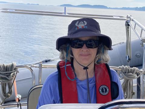 Behind the wheel, Rachel and her husband enjoy sailing whenever time allows.