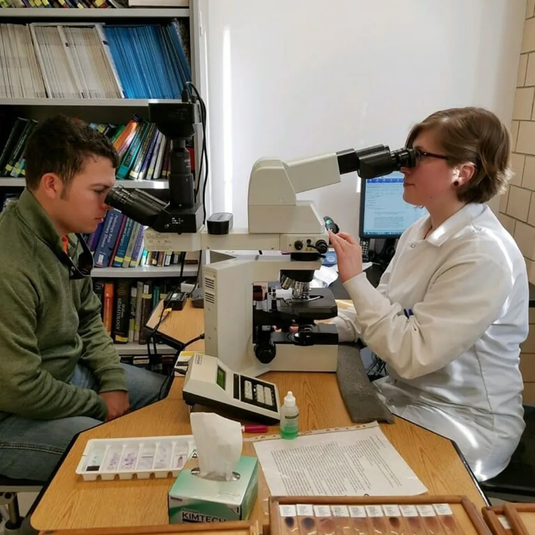 Aidan and Megan reviewing his slides in Clin Path