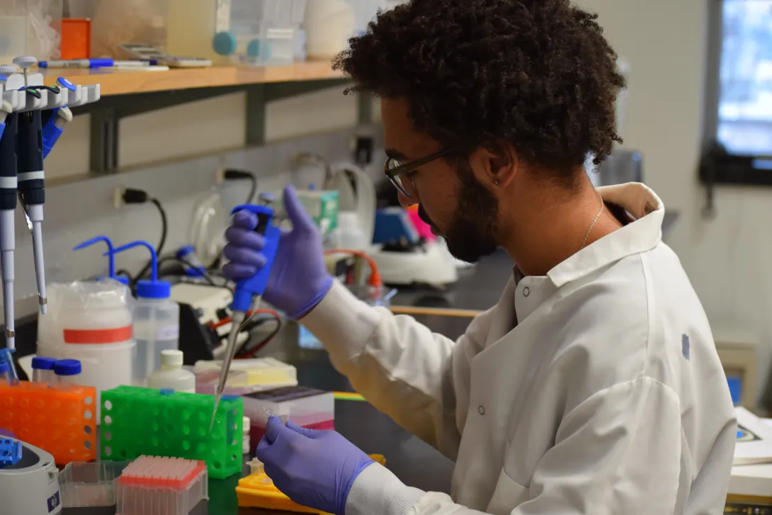 Dante preparing samples in the lab