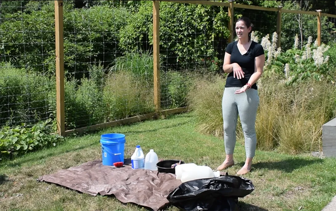 Dr. Bloodgood showing a cleanup station after a mock field outbreak investigation during a DEC Wildlife Health workshop - emphasizing the importance of biosecurity in the field.