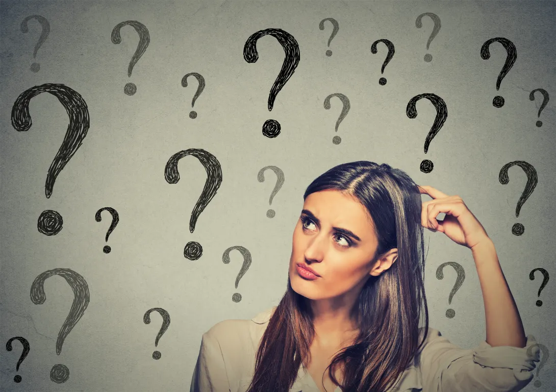 women with questions marks as a background