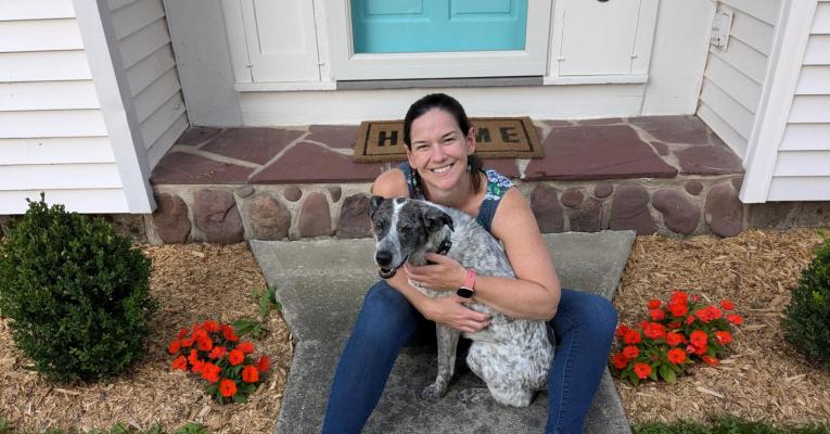 Jenny on the stoop with her dog Zoey