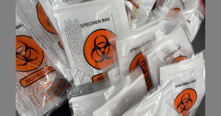 bags of biological samples on desk