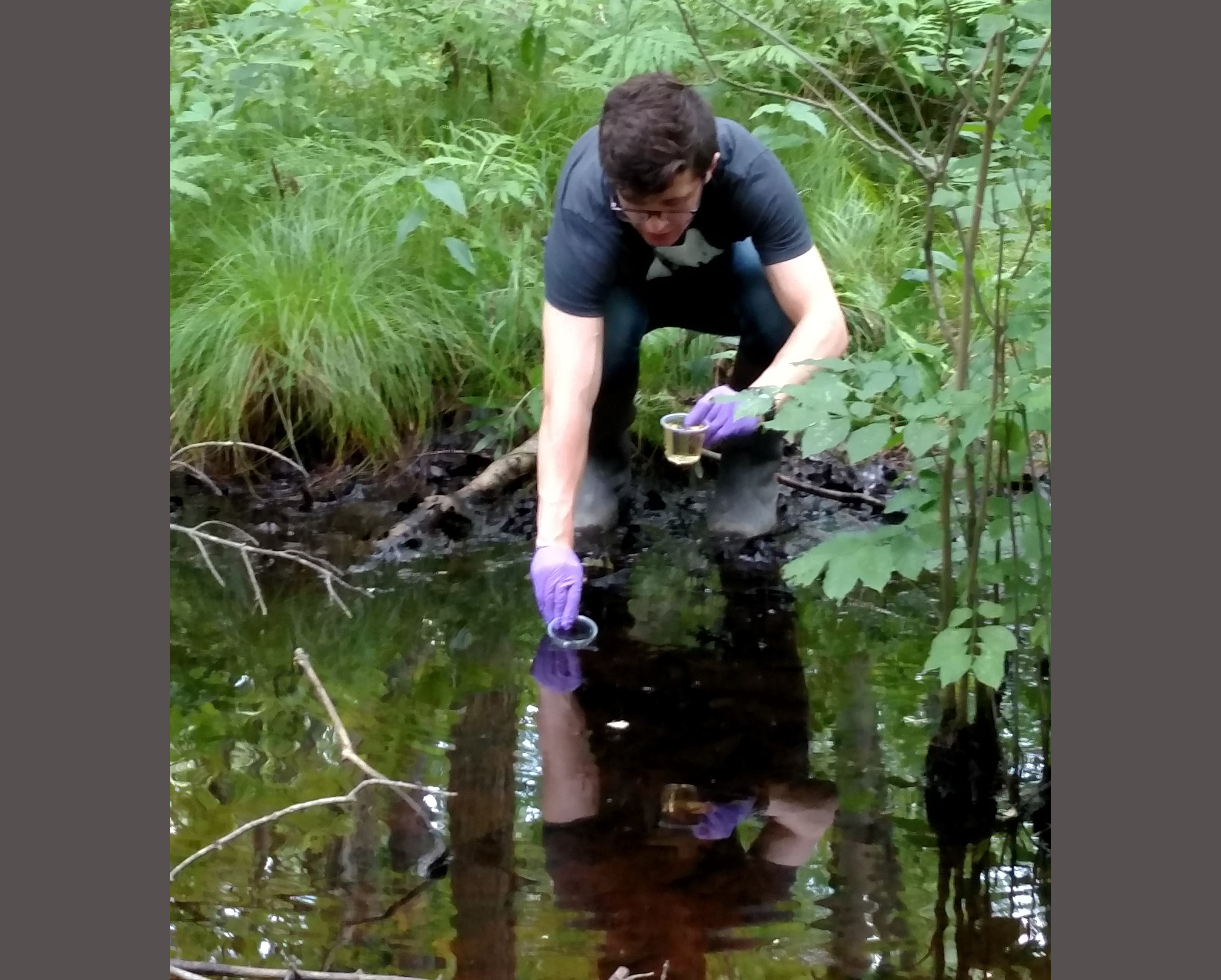 student collecting water samples