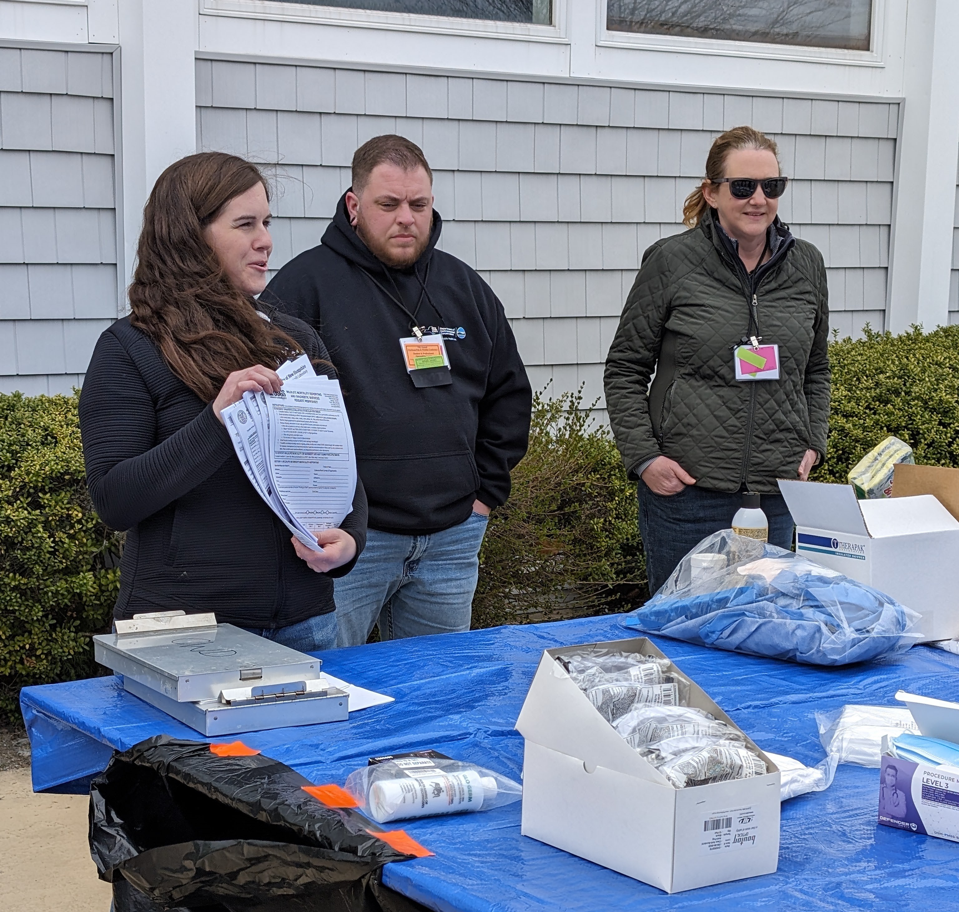 Melanie demonstrating sampling protocols with DEC Research Scientist, Landon Miller and CWHL Director Krysten Schuler